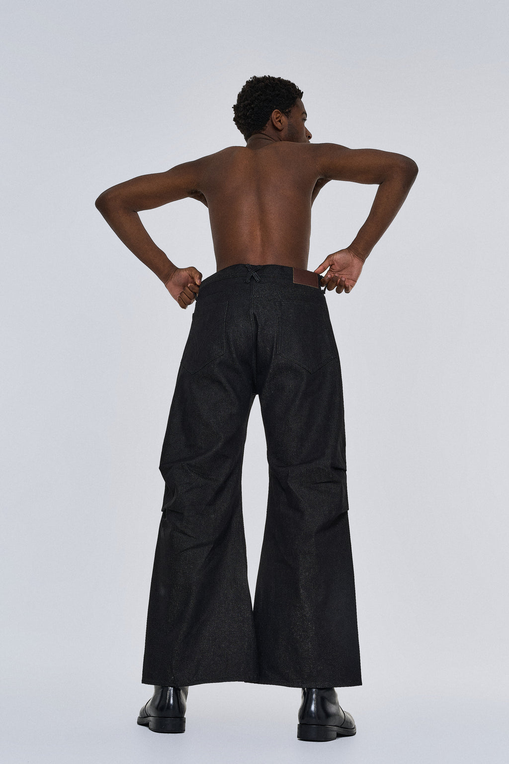 Knee Tuck Flare Denim