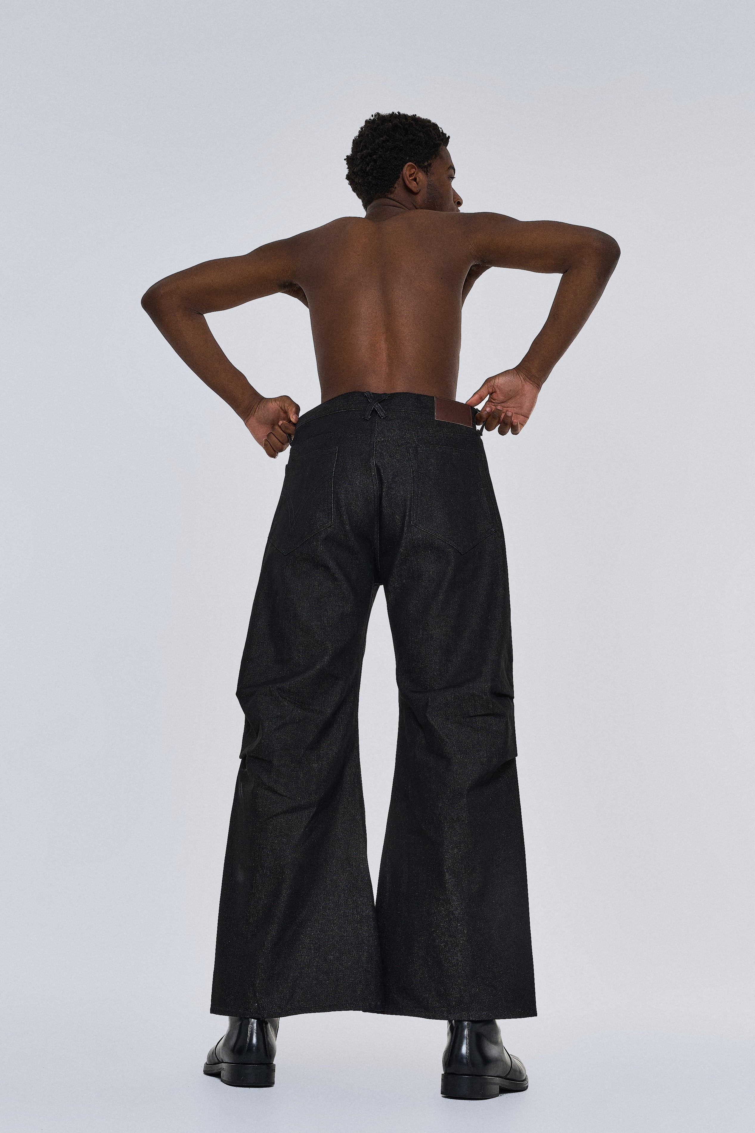 Knee Tuck Flare Denim